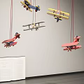 Colorful Hanging Airplane Model Decorations with Red Yellow Designs for Room Decoration