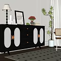 Black Sideboard With Glass Doors And Gold Handles In Elegant Interior With Decorative Items