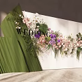 Wedding Flower Decoration With Pink Purple White Blooms And Green Fabric On White Backdrop