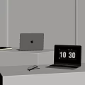 Modern Laptop Display Featuring Open And Closed Notebooks With Screen Time And Accessories On Stand