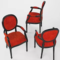 Elegant classic style armchairs with red velvet upholstered seats and black wooden frames