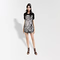 Woman in Patterned Short Dress With Black Top Brown Sandals on White Background