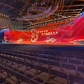 Grand Conference Venue With Red Stage Film Elements And Seats
