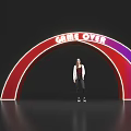 Vibrant Red Purple Archway Featuring GAME OVER Text With Person Standing Underneath
