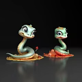 Two Green Snake Figurine Decorative Ornament Set With Colorful Base And Red Accents