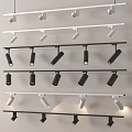 Track Spotlights and Downlights Installed on White and Black Tracks with Adjustable Angles 3d model