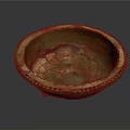 Carved Brass Bowl With Intricate Decorative Rim And Detailed Interior Patterns