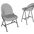 Light Colored Fabric Dining Chairs With Modern Sleek Metal Legs And Comfortable Design