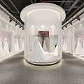 Elegant Bridal Shop Interior With Wedding Dresses White Display Stands Pink Backdrops And Chandelier