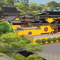 Traditional Chinese Ancient Architecture With Yellow Facade Classic Curved Roofs Courtyard And Stone Pavement