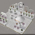 Flower Shop Interior With White Decorative Stands And Assorted Floral Displays