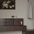 Cozy Bedroom Interior With Dark Wooden Headboard Wall Lamp And Flower Vase