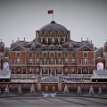 Cartoon Scenery Red Brick Building With Dome Towers Red Flag And Arched Details