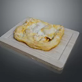 Golden Brown Baked Pastry Served On Wooden Cutting Board With Flaky Crust