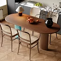 Modern Restaurant Interior With Oval Wooden Dining Table Chairs Fruit Bowl Vase And Table Lamp