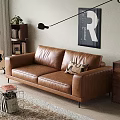 Brown Two Seater Leather Sofa with Patterned Cushion in Modern Living Room and Wall Art