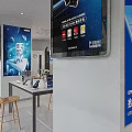 Bright Modern Digital Store Interior With HONOR Displays Electronic Gadgets And Display Counters