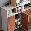 Brown White Modular File Cabinet With Perforated Design And Books Photo Frames In Bright Room