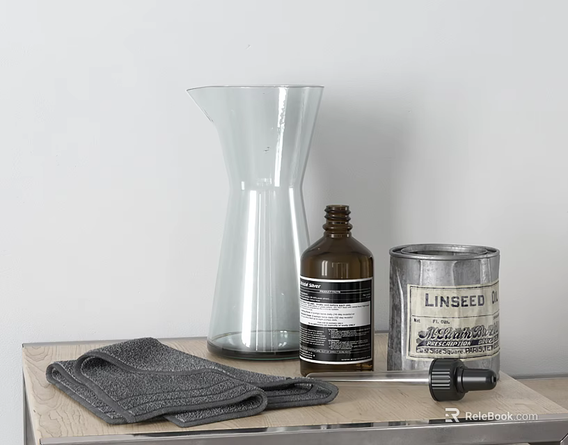 Stylish Decorative Ornament Set with Glass Vase Brown Bottle Linseed Can and Gray Cloth on Tray 3d model 