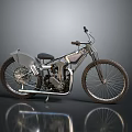 Vintage Motorcycle With Silver Body Black Seat Spoked Wheels And Metallic Finish On Reflective Surface