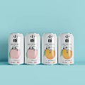 Four Xiaomeng Beverage Cans with Peach and Mango Flavors on Light Blue Background