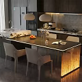 Modern Kitchen Interior With Illuminated Black Island And Dining Chairs