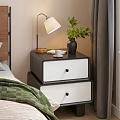 Modern Black And White Bedside Table With Two Drawers Lamp Green Plant Cup Wooden Tray