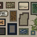 Diverse Framed Artworks With Various Patterns On Wall And Green Plant