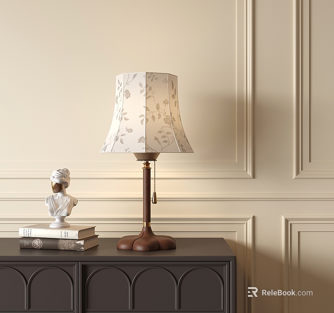 Elegant Table Lamp With Floral Patterned Shade Wooden Base On Dark Cabinet By Beige Wall 3d model 