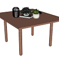 Brown Dining Table With Twisted Legs And Metal Decor Green Plant Succulent On Books