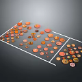Colorful Circular Sculptures With Orange Red Brown Tones Arranged In Grid Area On Dark Background