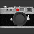 Vintage Electronic Camera With Silver Body Black Leather Surface And Large Classic Lens