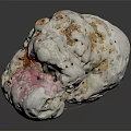 Natural White Stone With Red And Pink Inclusions And Detailed Textured Surface