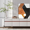 Modern Sleek TV Stand With Decorative Ornaments Plant And Geometric Artwork