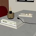 Modern Transparent Globe Table Lamp with Gold Base on PRADA GUCCI Books and Candle Tray