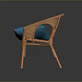 Wicker Outdoor Chair With Blue Cushion And Curved Armrests For Stylish Seating