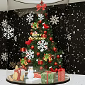 Christmas Themed Window Display With Decorated Tree Snowflakes Gifts And Merry Christmas Sign