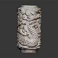 Intricate Carved Stone Pillar With Detailed Dragon Carvings And Ornate Patterns