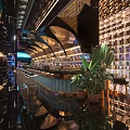 Elegant Modern Bar Interior With Stylish Bar Counter Wine Racks Ambient Lighting And Green Plants