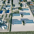 Modern Industrial Factory Buildings Aerial View with Blue Roof Green Area and Organized Layout