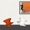 Red And White Conical Objects On Black White Checkered Table With Orange Black Wall Art 3d model