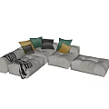 Modern Gray Sectional Sofa With Yellow Green Cushions And Striped Blanket