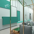 Modern Luxury Clothing Store With Green White Decor Clothing Racks Display Area And Chandeliers