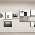 Minimalist Photo Wall With Multiple Black And White Frames On White Wall 3d model