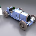 Vintage Blue Race Car Model Display With White Flower Pots And Green Plants