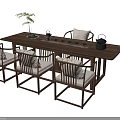 Modern Chinese Style Tea Table and Chairs with Light Cushions Teaware and Small Potted Plant