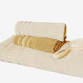 Soft Beige and Light Brown Folded Towels with Matching Brush Set