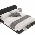 Double Bed With Soft Upholstered Headboard Striped Bedspread Plaid Pillow And Round Nightstand