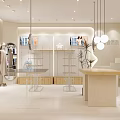 Modern Stylish Boutique Interior With Metal Display Racks Round Counter Pendant Lights And Green Plants
