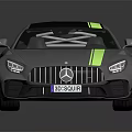 Silver Mercedes AMG Sports Car with Green Stripes and Rear Spoiler Design